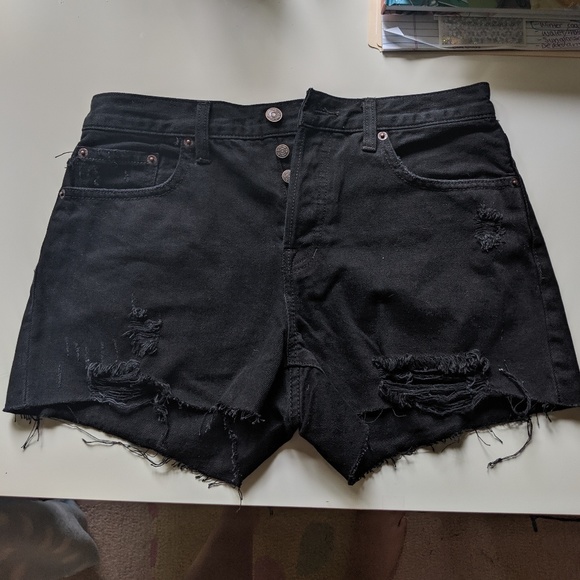 black ripped jean shorts